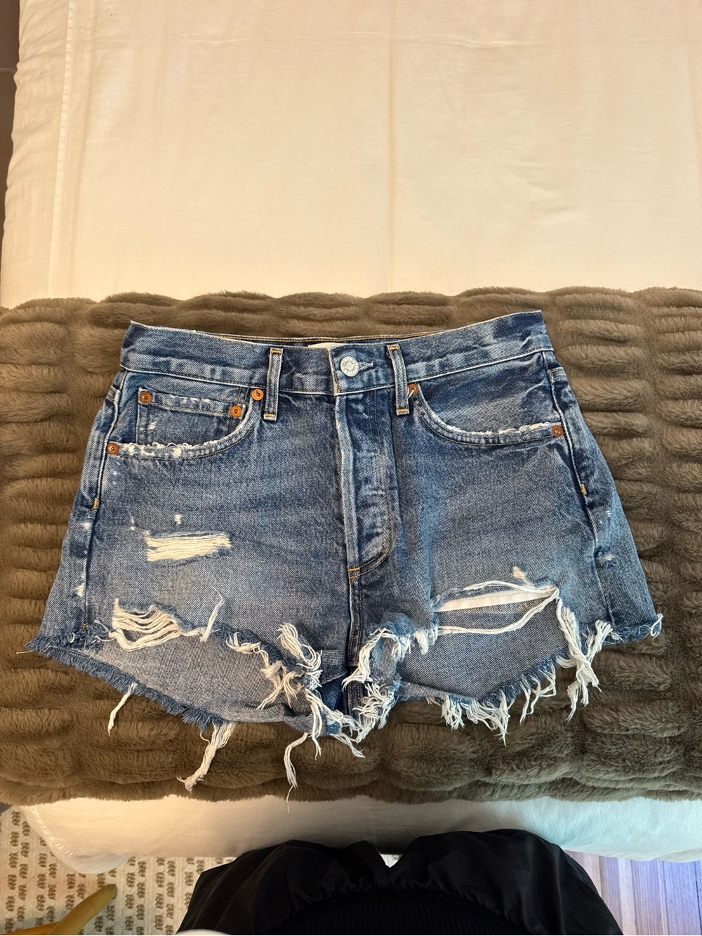 Agolde Distressed Cutoff Denim Shorts in Blue Wash